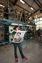 %_tempFileNameCassie%20with%20newspaper%2003%